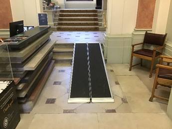 A photograph of a ramp placed over the steps by the Reception at Burlington House